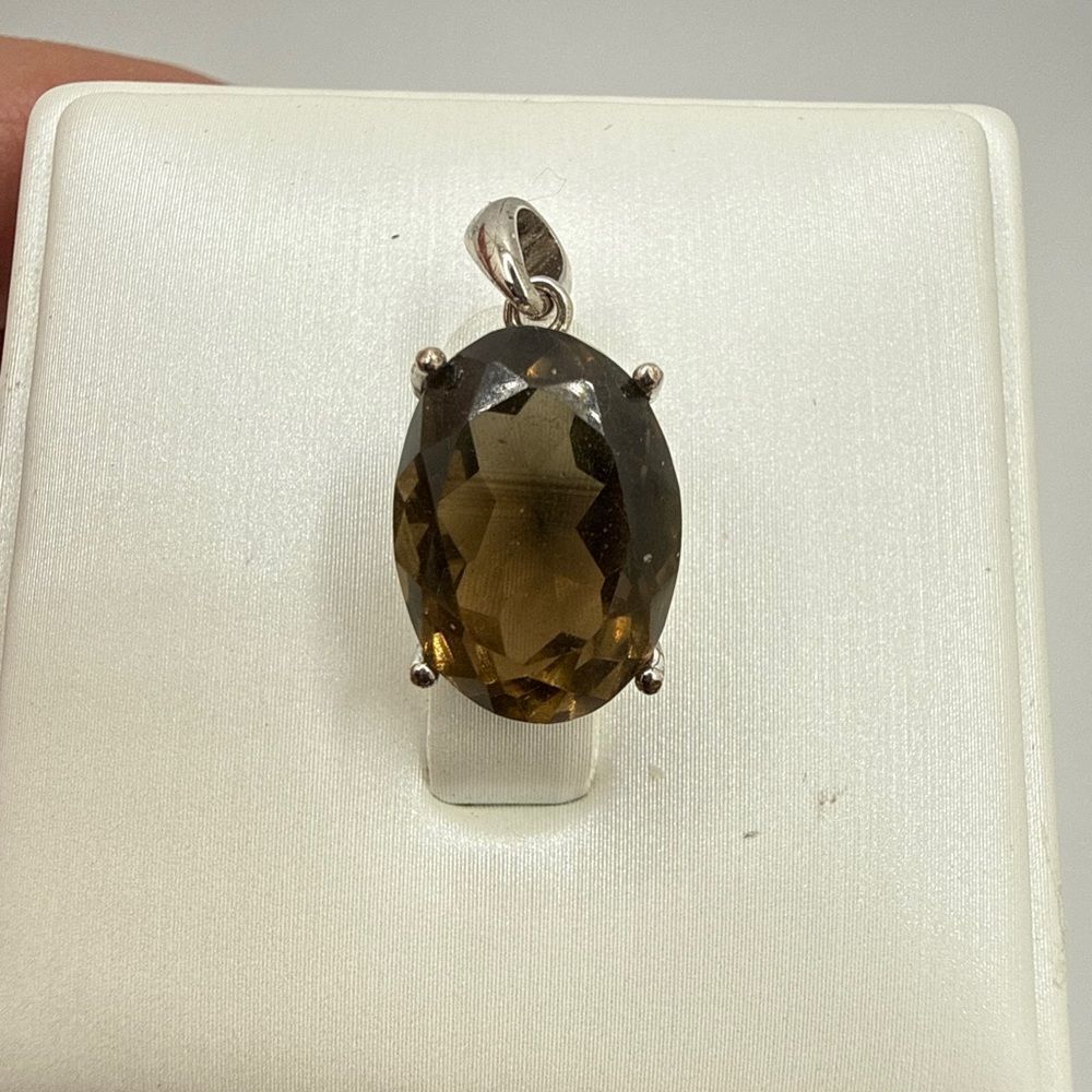 NWOT 10x14mm oval cut, faceted smoky quartz pendant in sterling silver!